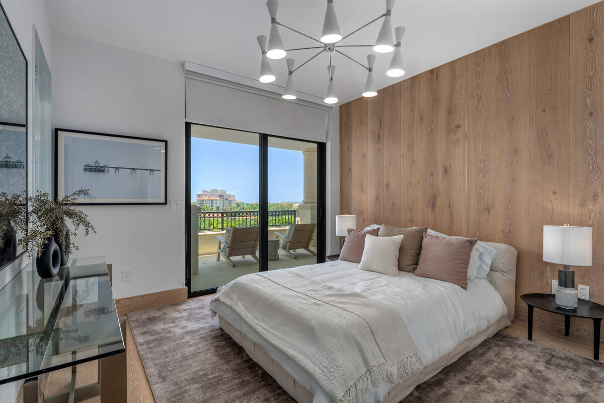 One of five bedrooms in a recently-listed condo on Fisher Island.
